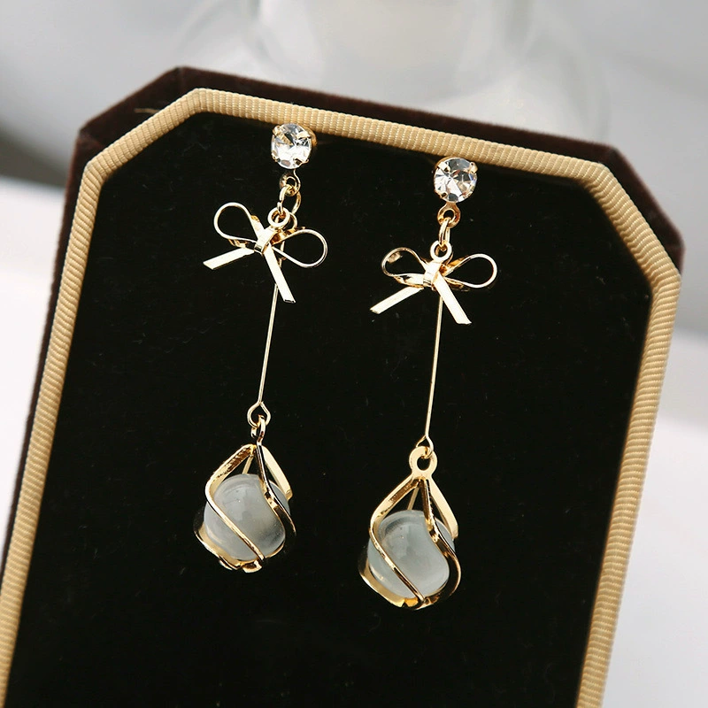 Earrings silver 925, bow design with cat's‑eye drop, lightweight dangle, trend seasonal style