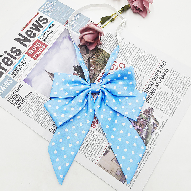 Punto al por mayor de doble capa oblicua pajarita de lunares moda nueva camisa estilo universitario uniforme enorme mango largo cuello JK flor