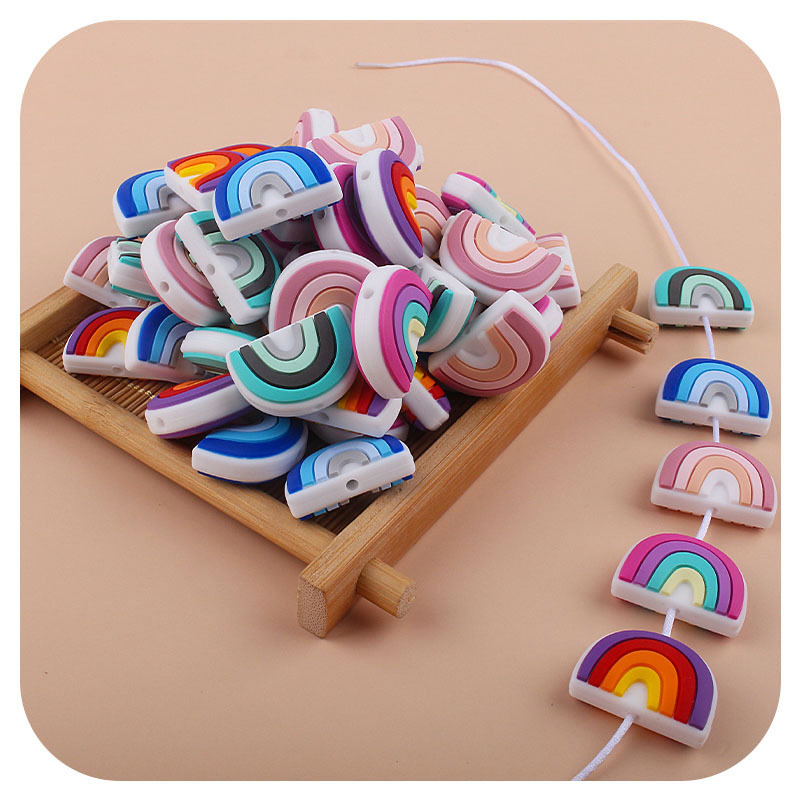Creativo DIY bebé suministros de dibujos animados de silicona Arco Iris juguete mordedor bebé molar pezón anti-gota cadena Accesorios