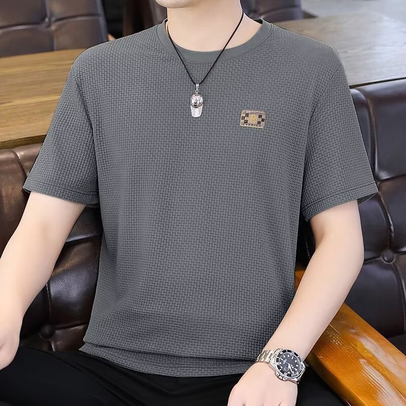 T-shirt de manga corta marca de moda masculina de verano suelta manga de cinco puntos 2026 nueva tendencia en línea in simple impresión superior