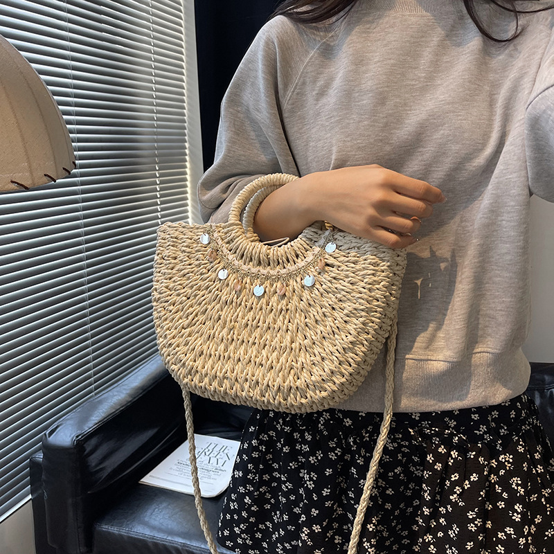 Bolso de vacaciones junto al mar 2025 verano nuevo estilo bolso de hombro de playa tejido de paja bolso de mensajero de gran capacidad mujer