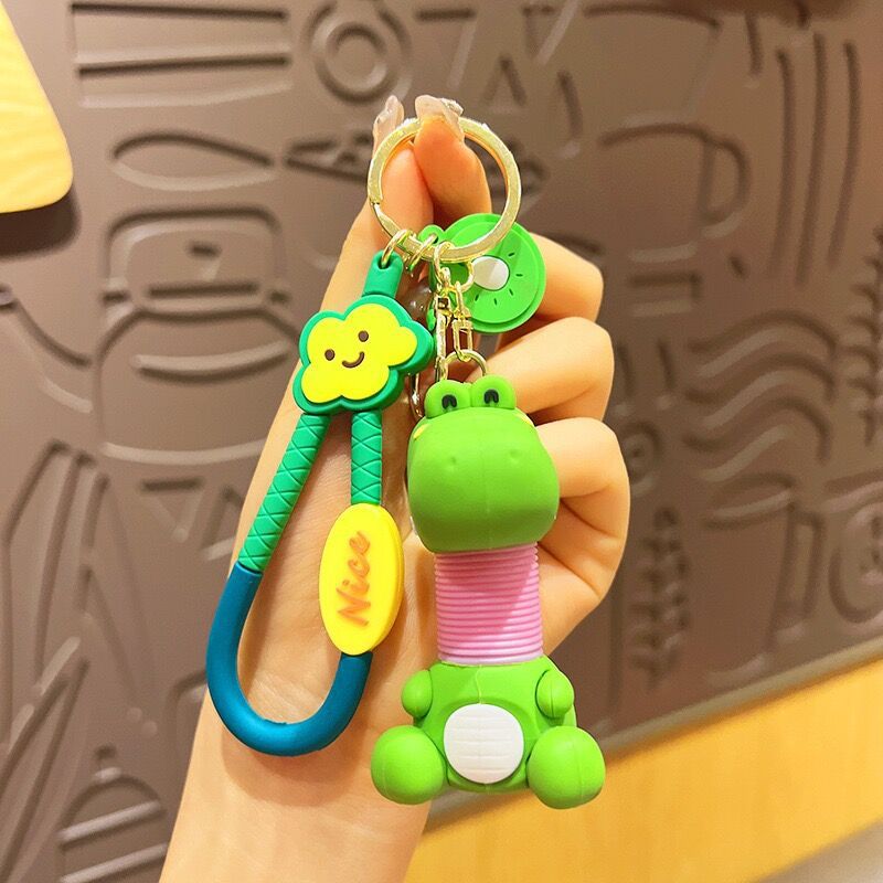 Llavero de cuello telescópico creativo de dibujos animados Divertido colgante de bolsa de descompresión colgante de coche cadena anillo pequeño regalo al por mayor