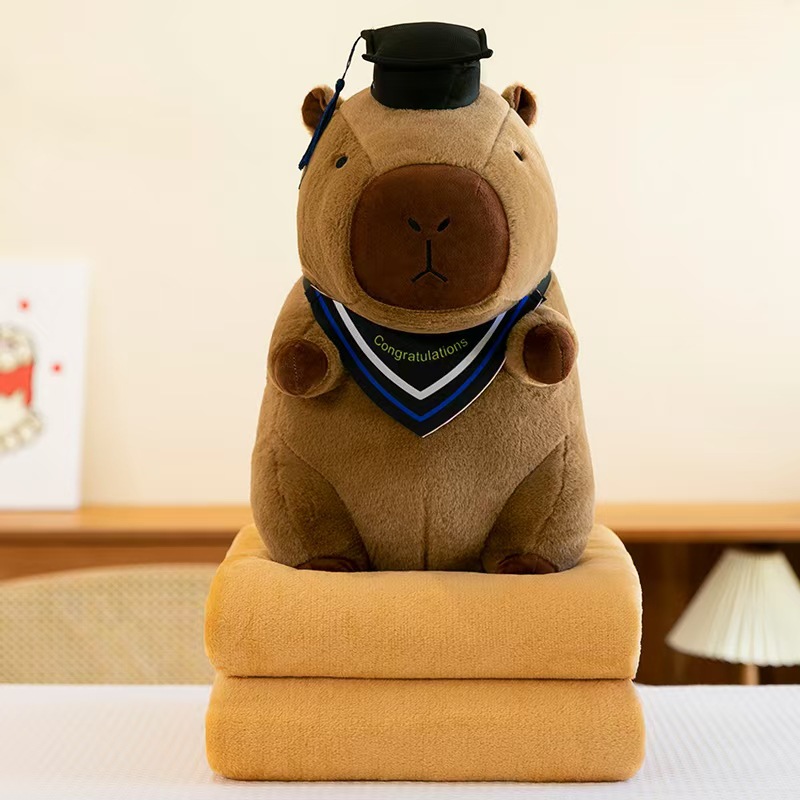 Caricatura capibara almohada manta dos en uno Carpibara cojín aire acondicionado es de doble uso niños siesta manta regalo