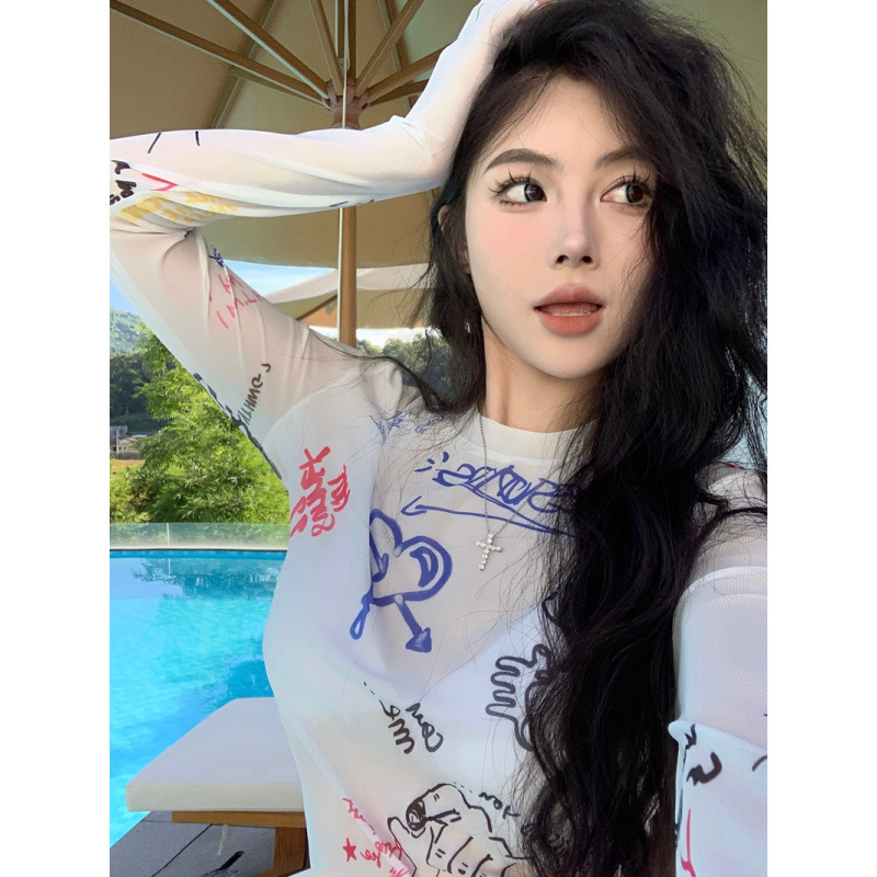 Xifengli non-negotiable price playful girl see-through mesh fun graffiti print skin-friendly sun protection long-sleeve T-shirt