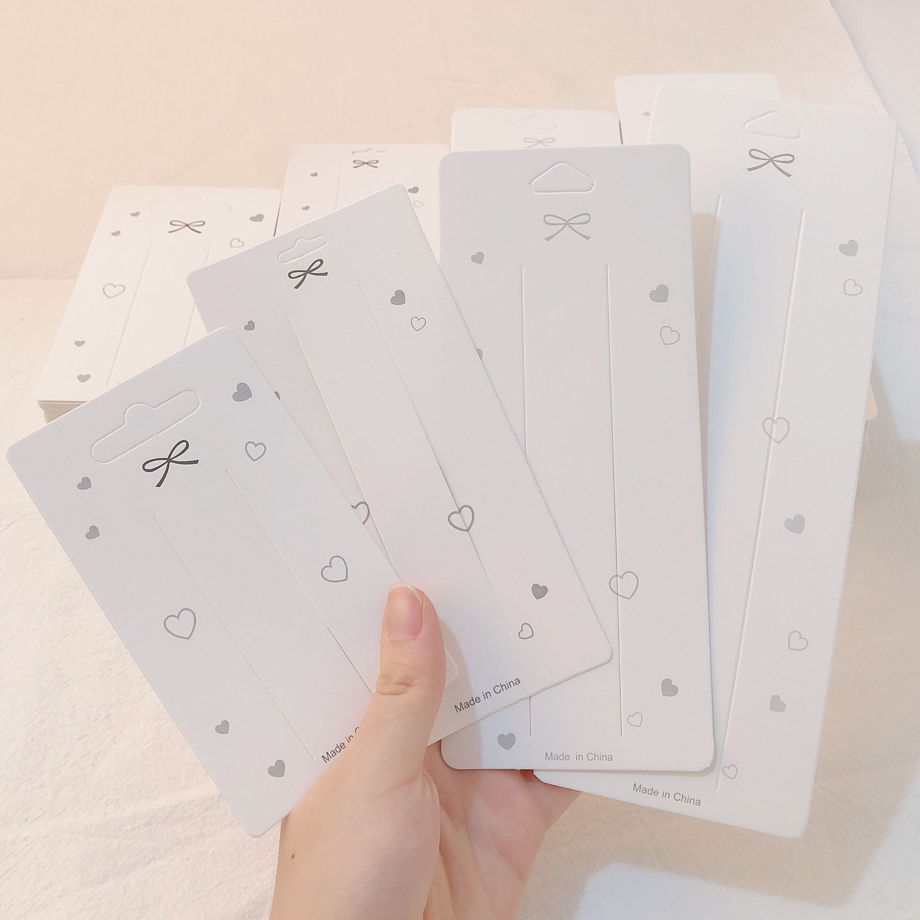 Corea del Sur Dongdaemun misma tarjeta de moda embalaje engrosada horquilla accesorios para el cabello de doble uso cartón coreano