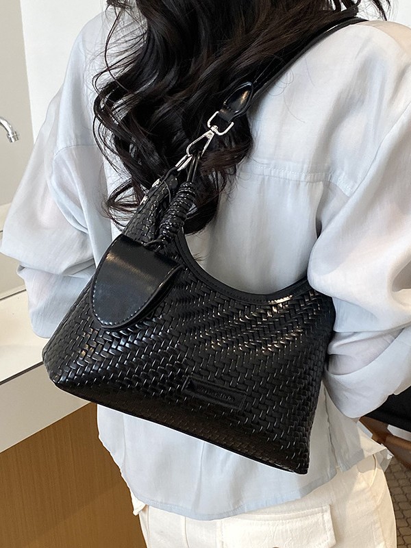 Nicho de diseño de hombro brazalete para mujeres 2026 verano nueva moda trenzada mochila de viaje ocio bolsa de mano