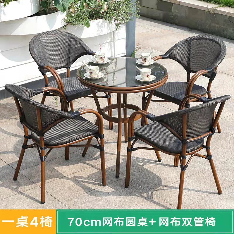 Mesa y silla al aire libre leche tienda de té cafetería silla de malla Silla de ratán Patio de tres piezas balcón mesa y silla de ocio al aire libre