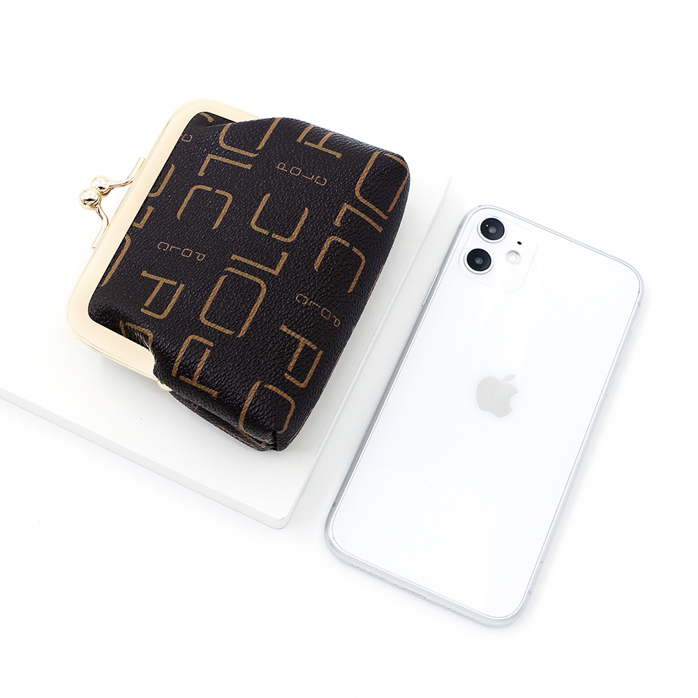 Bolsas de tarjetas de letras retro europeas y americanas bolsas de cambio impresión de gran capacidad de oro bolsas de auriculares bolsas de monedas bolsas de lápiz labial