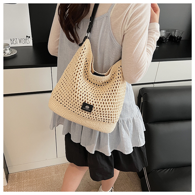 Summer hollowed-out knitted underarm bag for women, 2025 new style, laid-back and relaxed, seaside vacation style single-shoulder crossbody bag undefined
