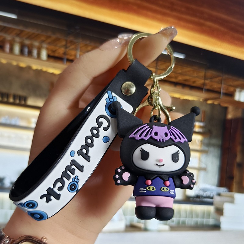 Perro de orejas grandes Melody KT gato pudín perro Kolomi caricatura de silicona llavero colgante bolsa colgante caja ciega regalo