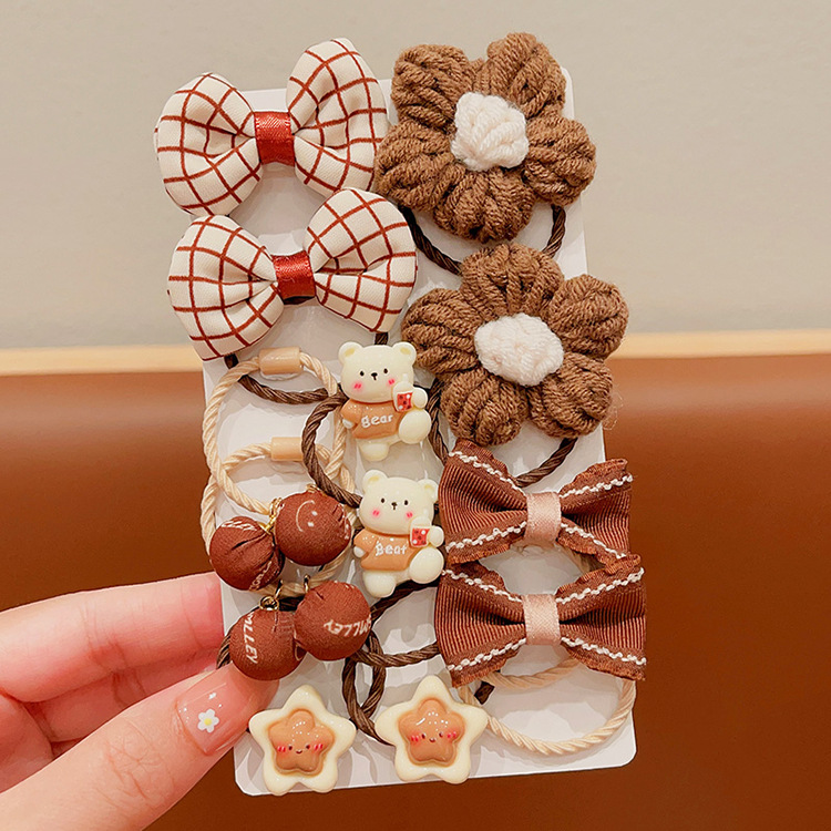 La banda de goma de la flor marrón de la leche de las muchachas de la venda de los niños no lastima el pelo banda elástica alta del pelo de la cola de caballo