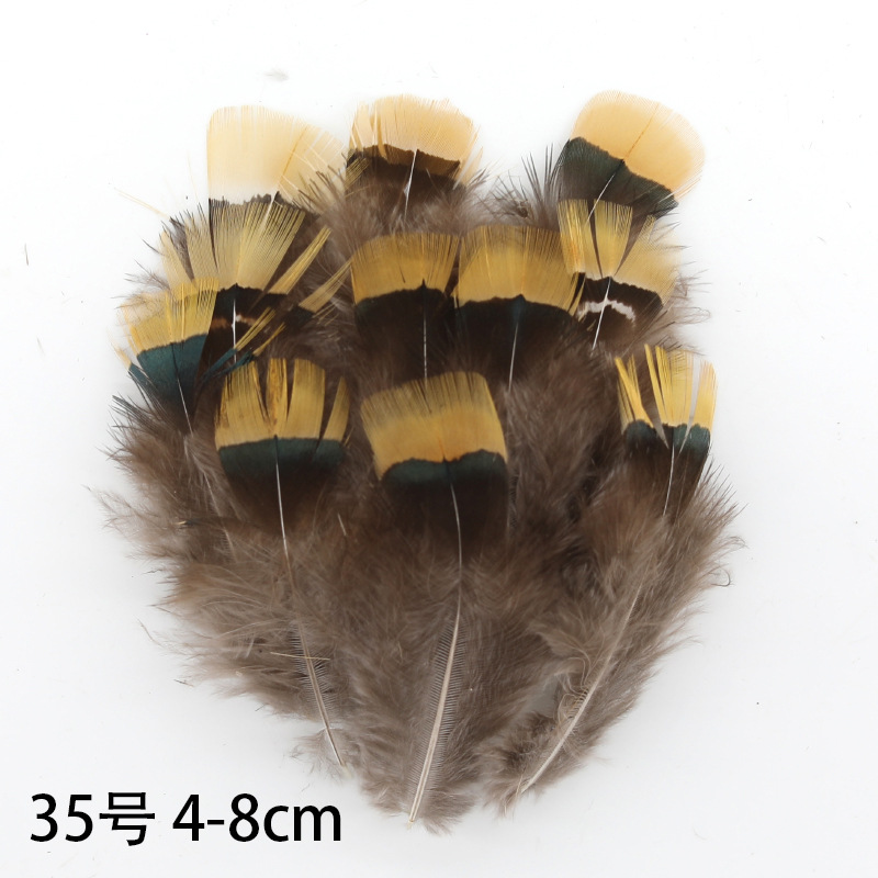 Fábrica al por mayor de bricolaje plumas pequeñas plumas naturales plumas de pollo salvaje plumas de pato jardín de infantes joyas hechas a mano gato divertido material de captura de sueños