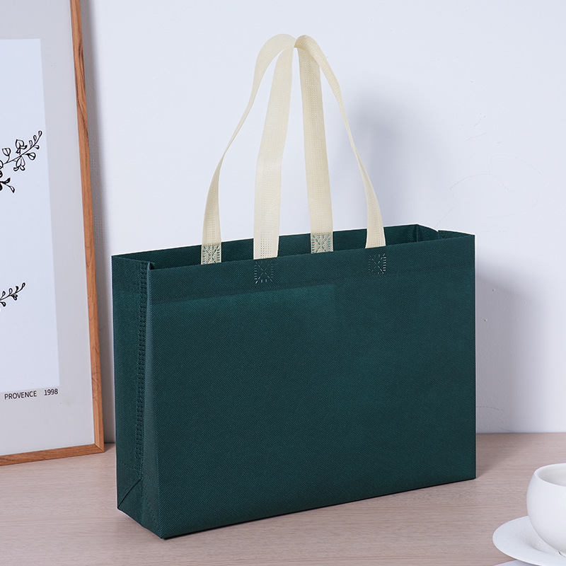 Bolsa de tela no tejida con logotipo impreso bolsa de compras de ropa de protección ambiental bolsa de publicidad corporativa tridimensional