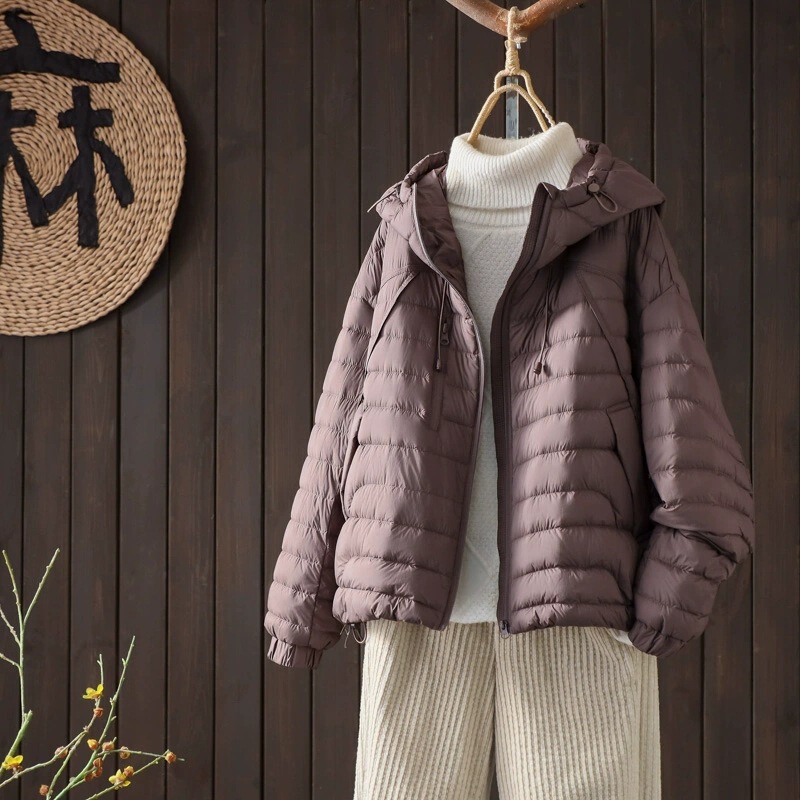 Down jacket women's short 2024 new European station fashion hooded solid color loose white duck down light coat