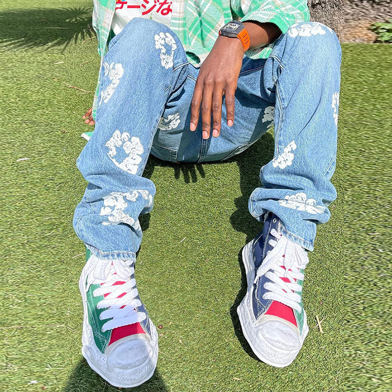 Estilo de celebridad transfronteriza otoño e invierno europeo y americano ins bolsillo lavado pantalones impresos jeans rectos sueltos para hombres