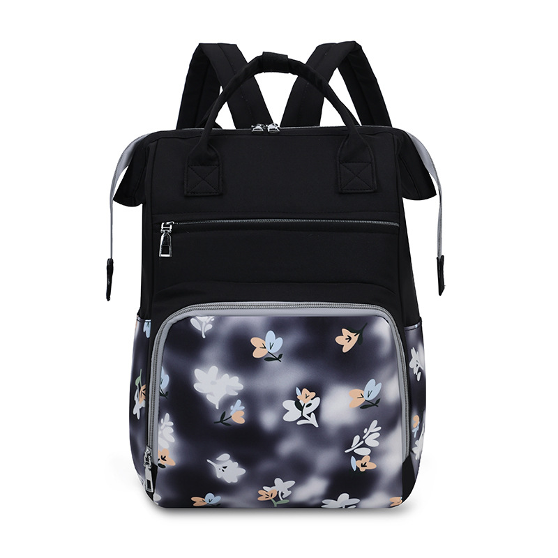 Bolsa de mamá nueva moda impresa mochila de viaje portátil mochila de mano bolsa de biberón independiente bolsa de bebé