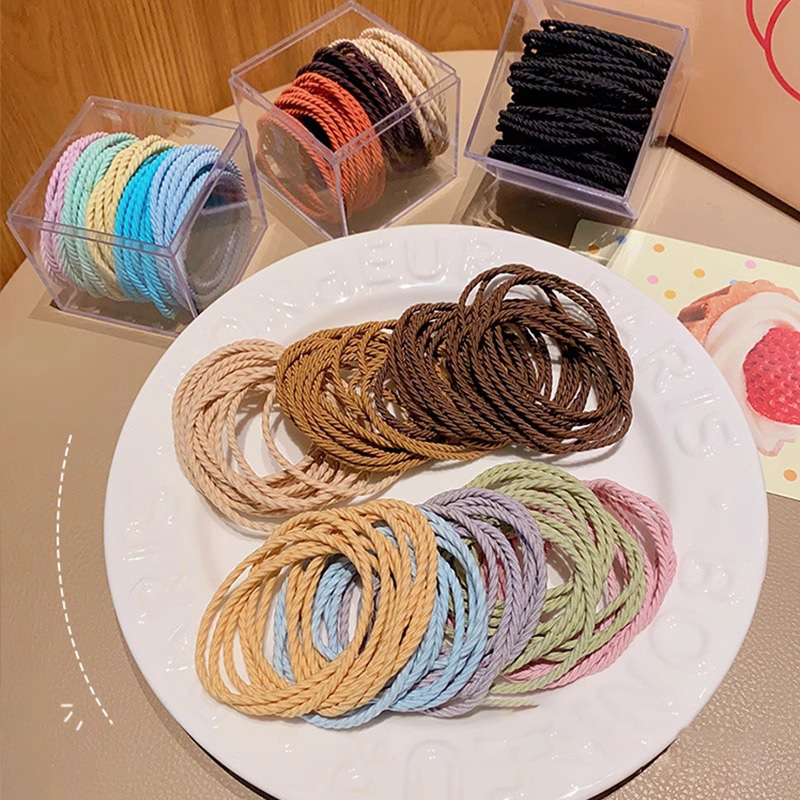 Alta elasticidad y durabilidad banda de goma simple cuerda de cabello de mujer corda de cabello de verano temperamento de cola de caballo color no daña anillo de cabello