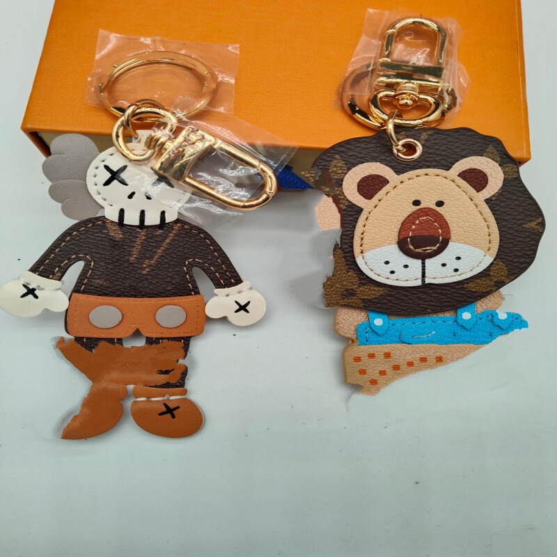 European and American Cute Little Animal Car Keychain Pendant Cartoon Shaking Head Lion Bag Pendant Couple Keychain