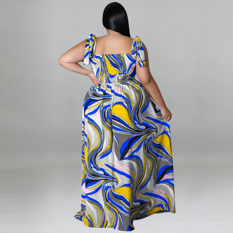 Maxi jurk met spaghettibandjes en smockwerk en strikprint_voghion.com