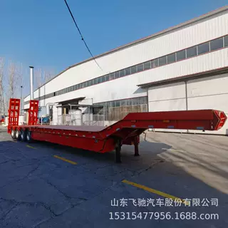 源头厂家供应制造4桥低平板半挂车机械爬梯式挂车机械设备运输车