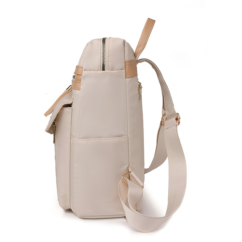 2023 nueva mochila de nailon para mujer simple moda borla literatura mochila de viaje de gran capacidad mochila escolar al por mayor