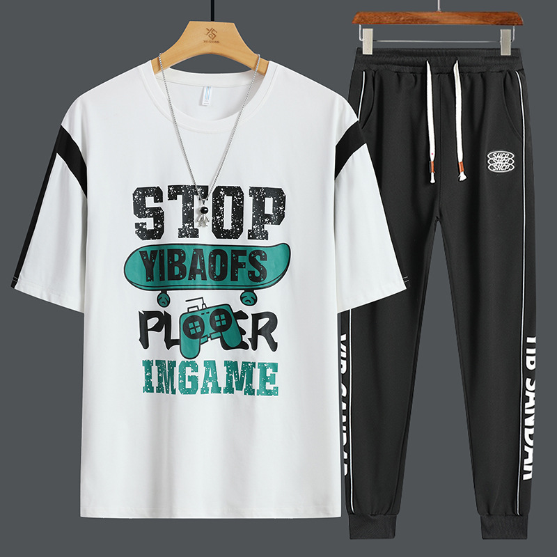 Conjunto de dos piezas de camiseta de cuello redondo holgada y deportiva informal juvenil de moda para el verano 2025 con pantalones y traje de manga corta para hombre