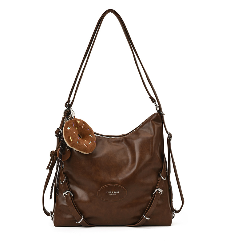 Mochila de viaje casual de mujer de gran capacidad mochila de cuero suave 2025 nueva mochila de estilo relajado retro versátil