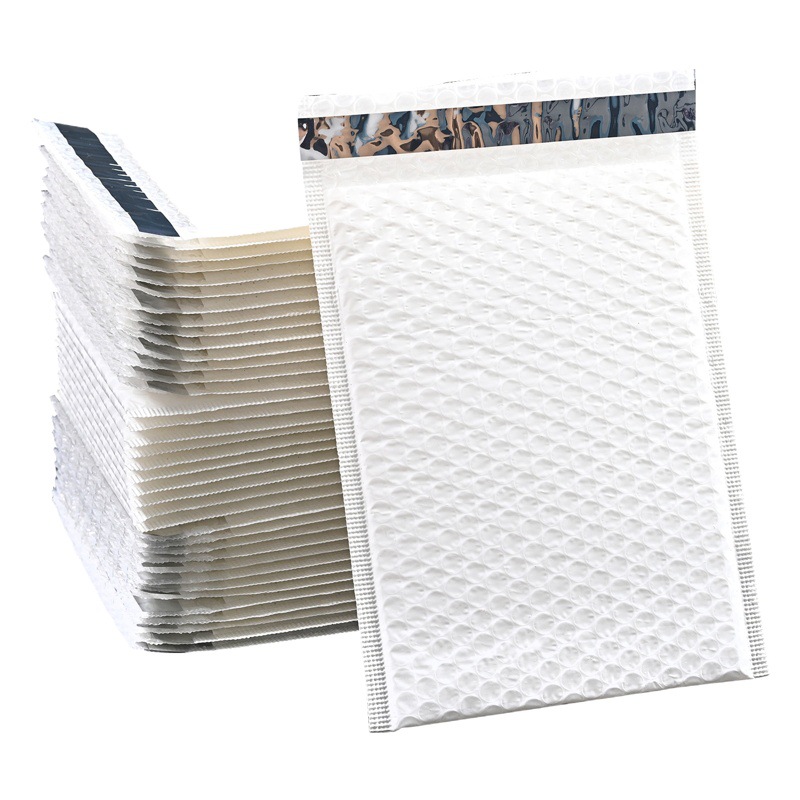 Bolsa de burbuja de ropa de película blanca lechosa bolsa de espuma bolsa de embalaje de tira de envoltura de película de perla a prueba de golpes impermeable al por mayor