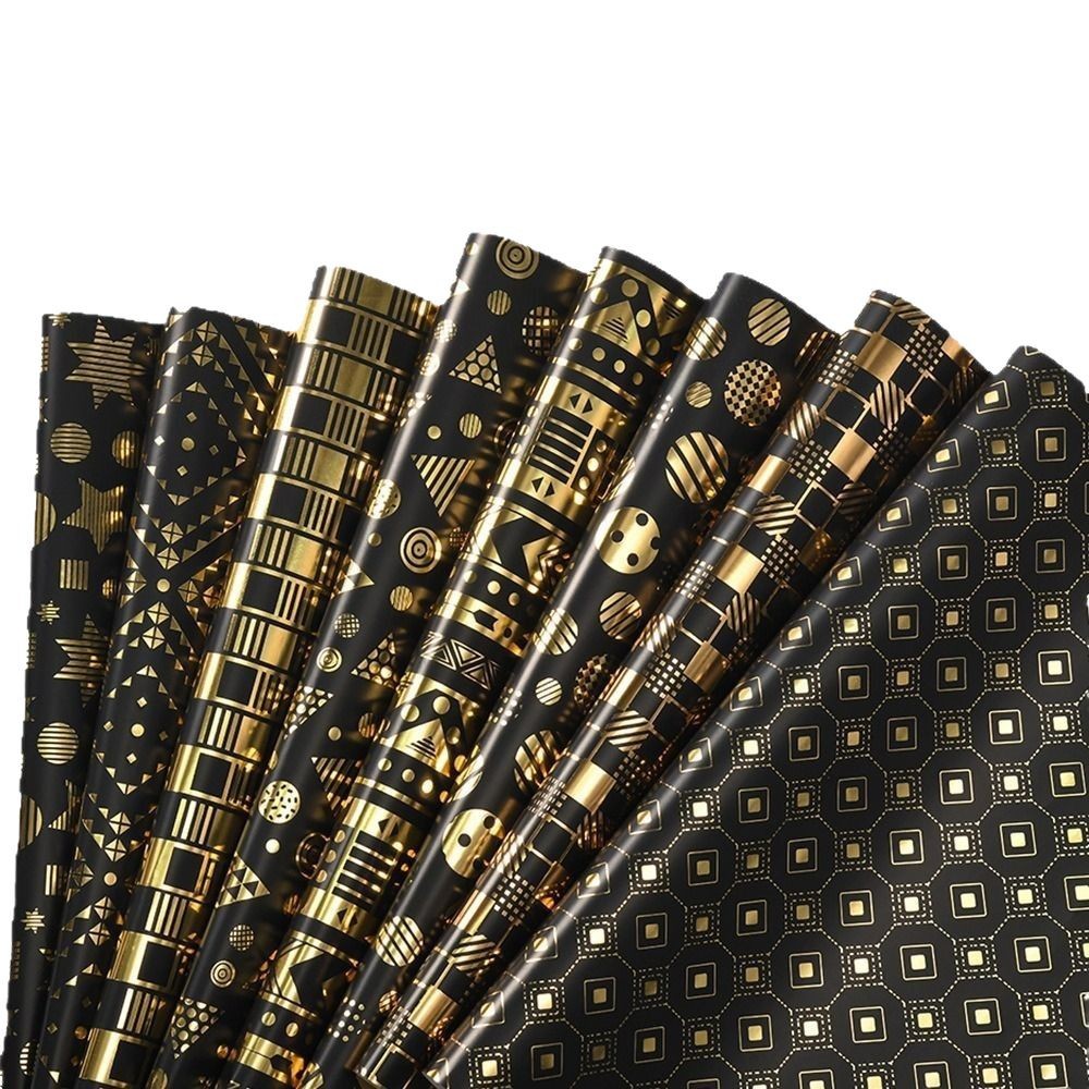 Nuevo papel de embalaje de caja de regalo grueso fondo negro estampado dorado estrella puntos rayas de papel de embalaje de regalo roll