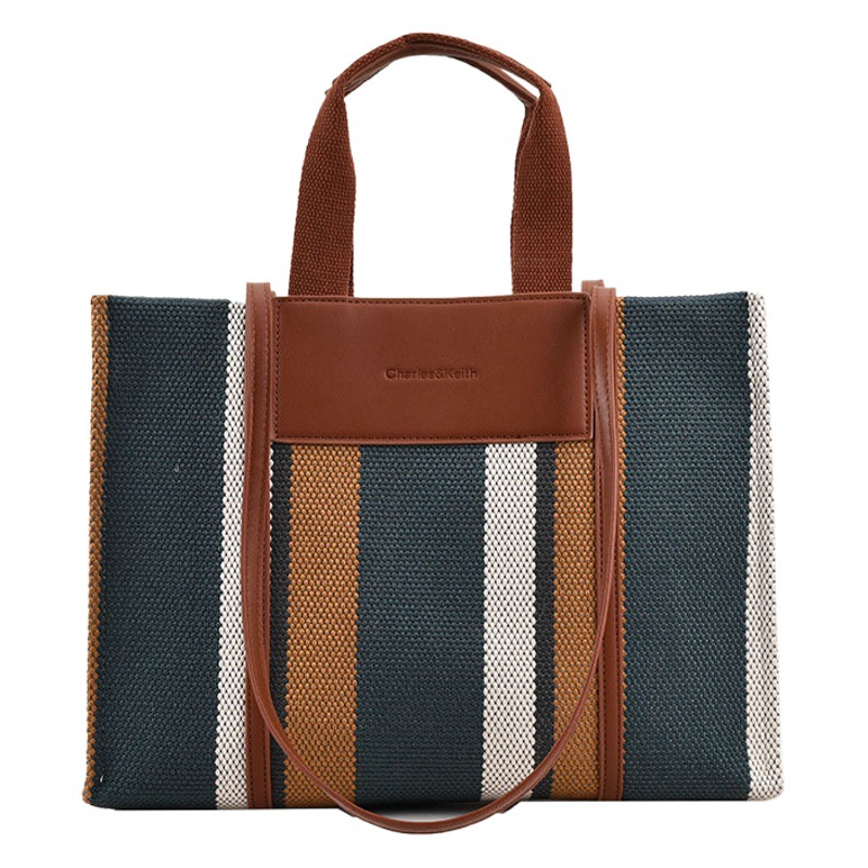 Bolso de mujer nueva línea transfronteriza lienzo color contraste bolso de mano rayas nicho de moda alta moda bolso de hombro