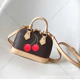 25新款樱桃贝壳包包女轻奢洋气百搭老花手拎包单肩斜挎包M13416