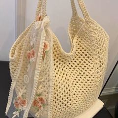 慵懒风腋下包女夏大容量棉线镂空编织包海边度假单肩托特包花织物