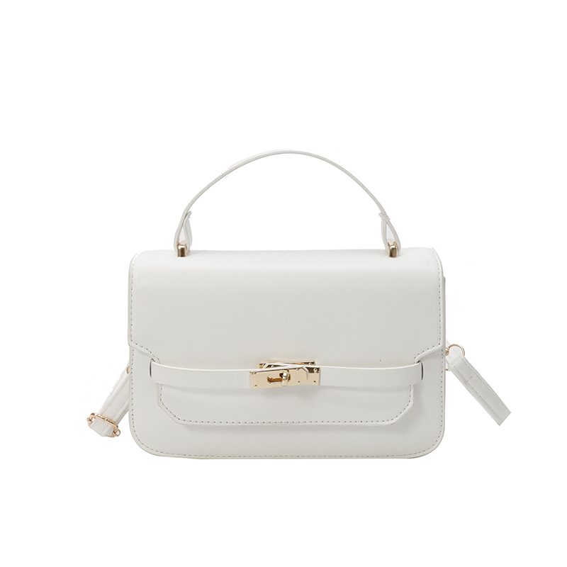Bolso de mano de color sólido nuevo estilo 2025 simple bolso de hombro de primavera coreano de moda con cierre bolso pequeño