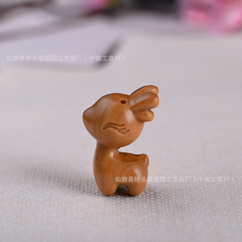 ローズウッド漫画かわいい安全な旅小さなかわいい鹿携帯電話ペンダント車のキーホルダーレディースバッグペンダント卸売|undefined