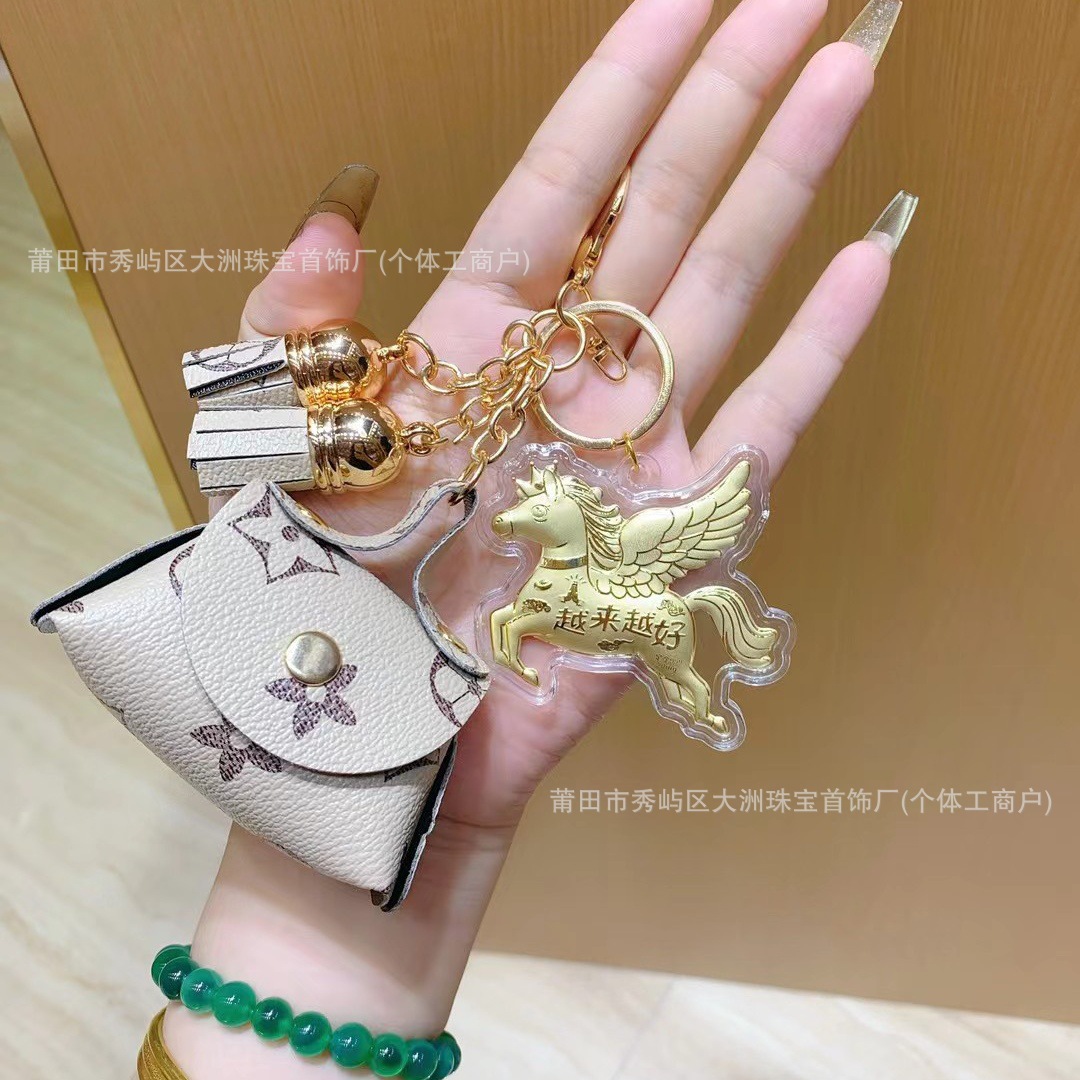 Año del Caballo de oro llavero de automóvil pequeño colgante 999 dinero de inmediato bolso llavero personalizado pequeño regalo