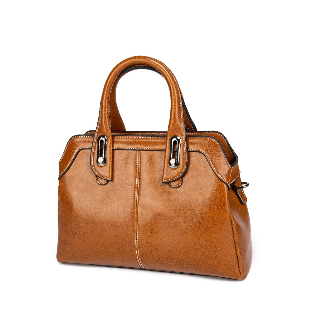 Fashionable handbag made of genuine leather with large capacity in 2024. It is a trendy stylish middle-aged mom and_voghion.com