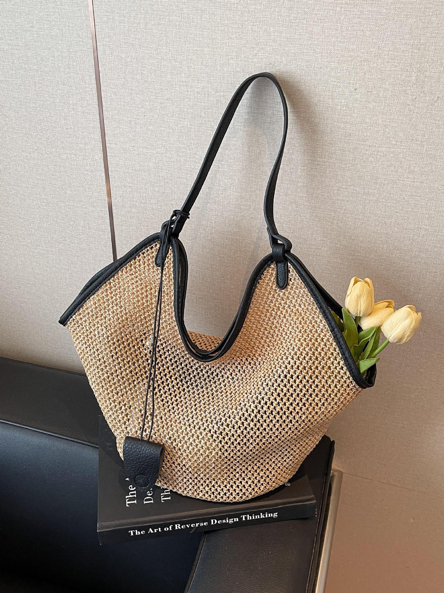 Bolso de paja de diseño hueco popular de verano para mujer 2025 nuevo bolso de viaje junto al mar bolso de viaje de gran capacidad