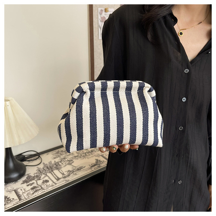 New cross-border fashion color-blocking striped cosmetic bag, women's loose change mobile phone storage bag, trendy and niche cloud clutch undefined