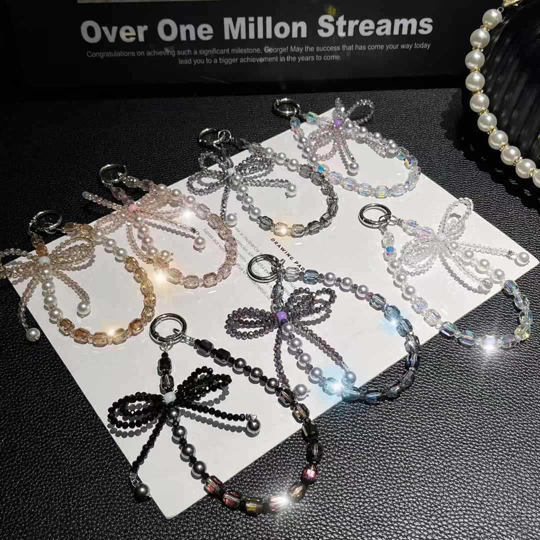 cadena de teléfono móvil estereoscópico de alta calidad arco de cristal caja de teléfono móvil colgante perla cuerdas de muñeca cuerdas de cuentas mujeres