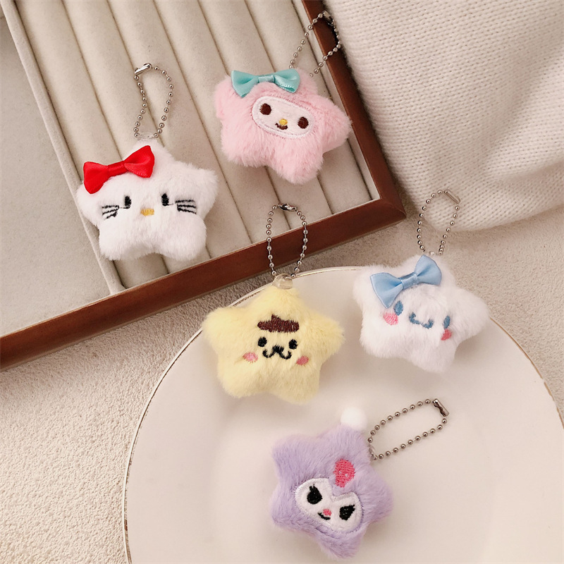 Nuevo estilo de felpa linda de dibujos animados arco estrella muñeca colgante monedero felpa auricular estuche llavero colgante