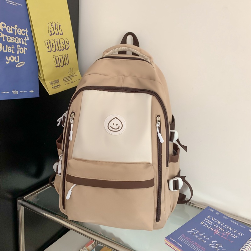 Mochila de lona coreana simple y versátil para mujeres 2023 nueva bolsa de gota de lluvia de gran capacidad mochila de ocio mochila de estudiantes