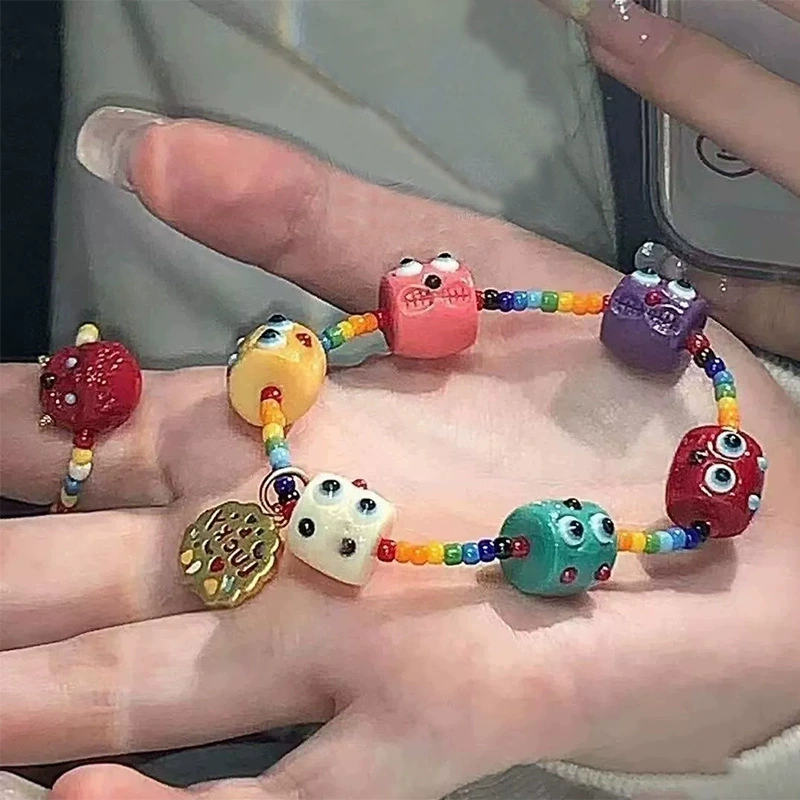 Beaded children's bracelet, adjustable cord, assorted charm styles, 10 cm
