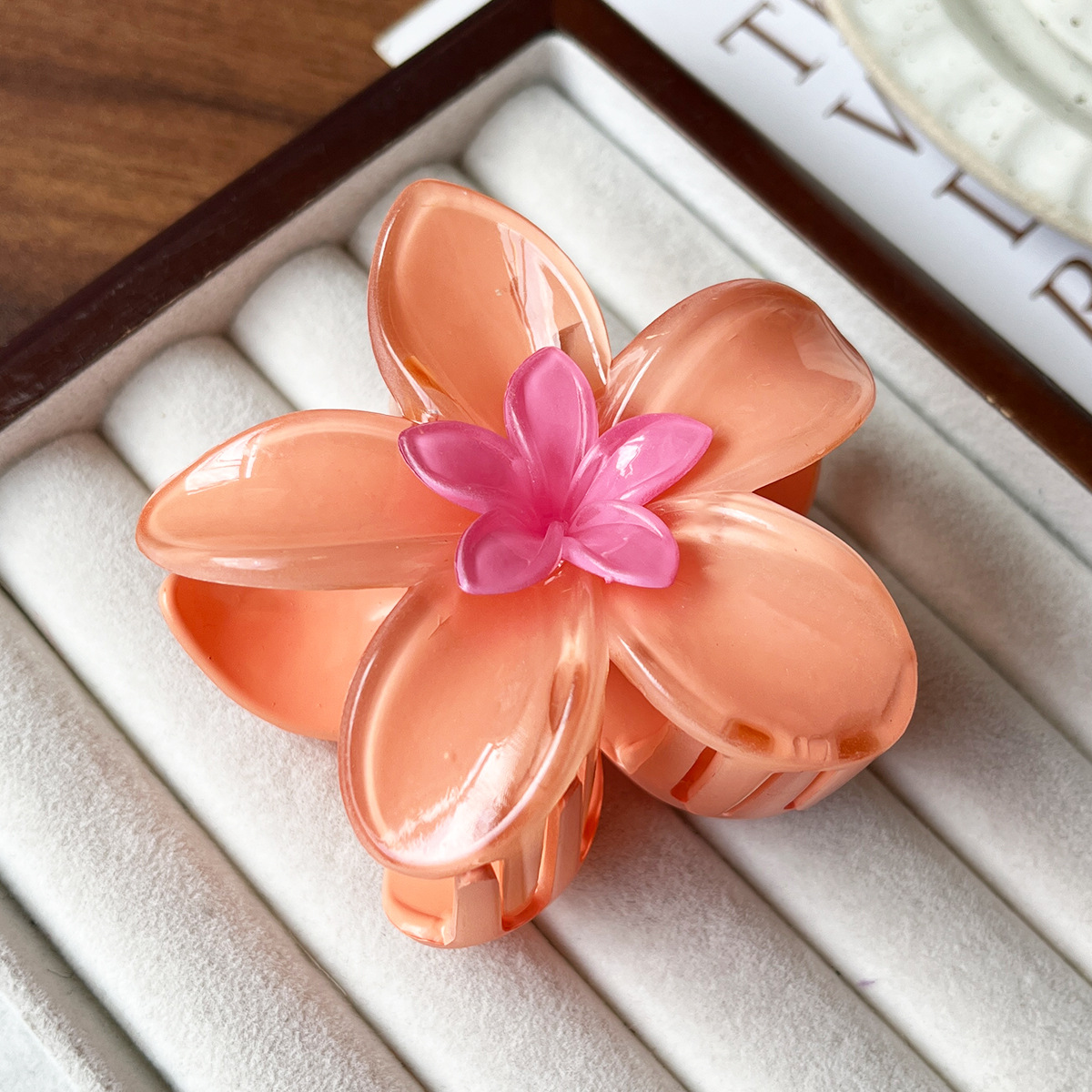 Nuevo estilo de Europa y los Estados Unidos venta caliente PC huevo mujer flores agarrando clip de cabello de color universal clip de garras de cabello de cola de caballo universal