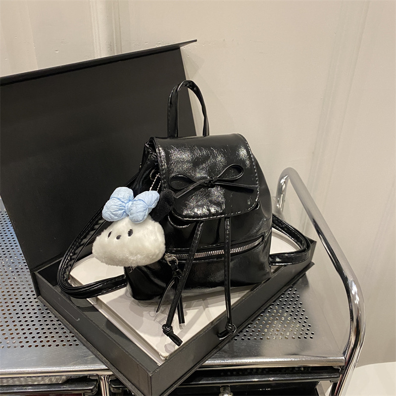 Mochila de nicho coreana para mujer, verano 2024, nueva mochila de moda, bolso de cubo portátil de un solo hombro de todo fósforo