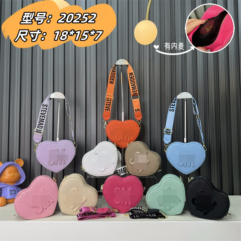 Bolso de hombro transfronterizo para mujer, sentido de alta gama, todo fósforo, letras al por mayor, bolso de mensajero simple, temperamento casual, bolso en forma de corazón