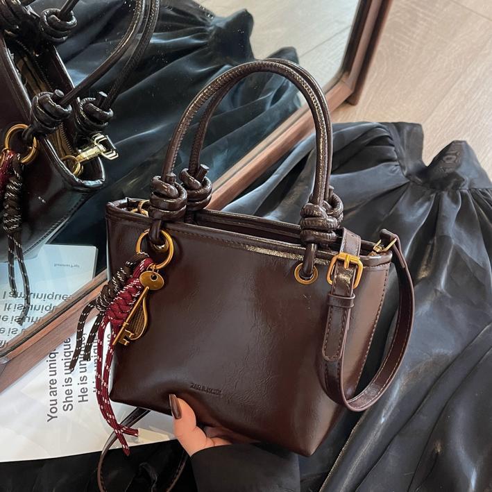 Alta sensación retro bolso para mujeres 2024 nuevo estilo versátil tendencia bolso de hombro bolso explosivo bolso de cubo portátil