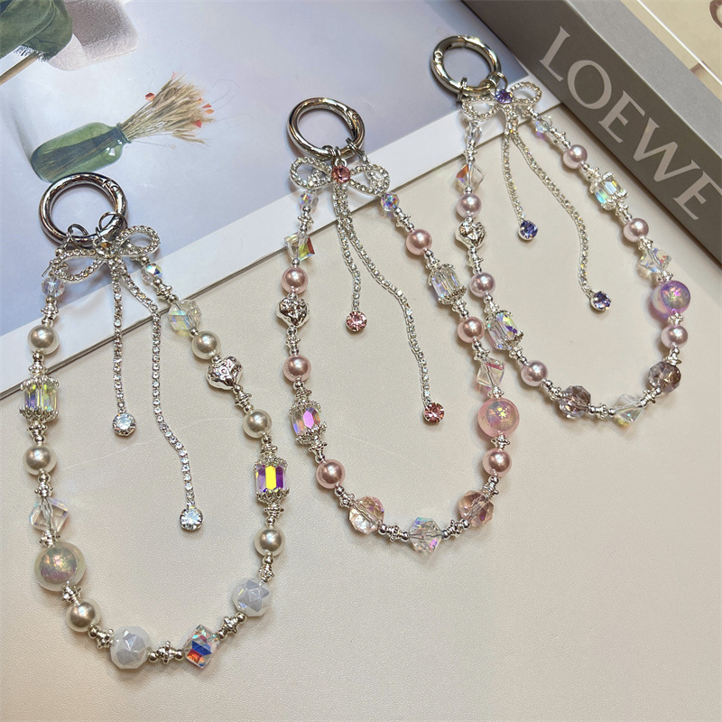 Fashionable and luxurious rhinestone bow tassel mobile phone chain, crystal bead mobile phone lanyard, short wrist handbag chain.