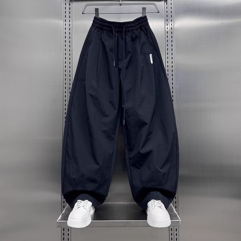 Spring and summer new men's American simple solid color fashion brand elastic waist casual pants fashion loose wide leg machete pants Spring and summer new men's American simple solid color fashion brand elastic waist casual pants fashion loose wide leg machete pants