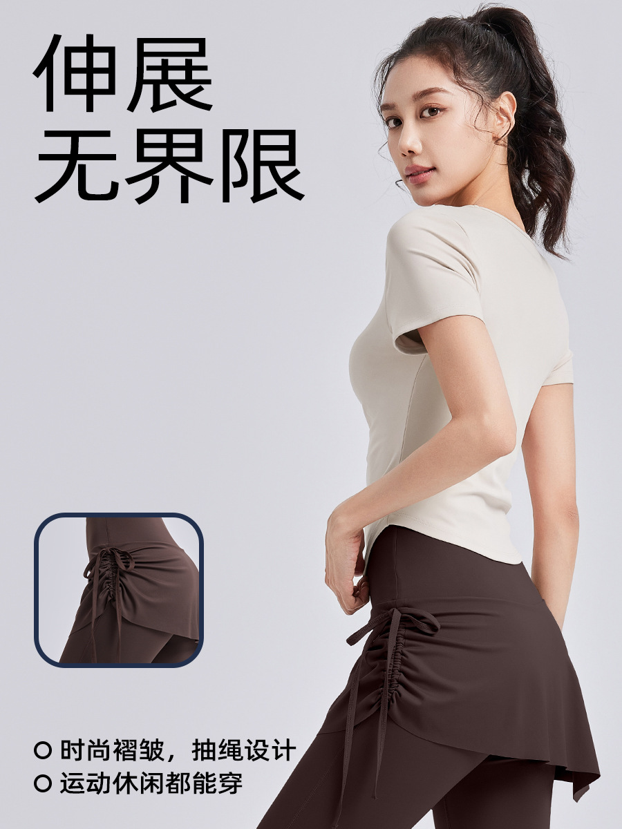 Juyitang Ropa de yoga hueca Camisa deportiva delgada de manga corta para mujer Traje de fitness de Pilates de entrenamiento para correr