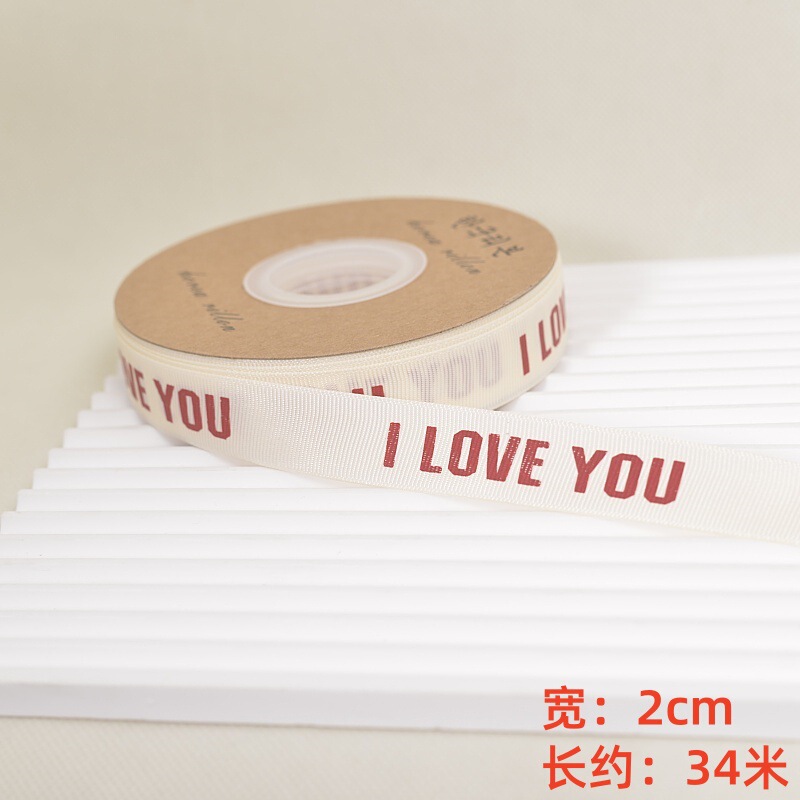 ネットの赤い文字の金のねじのケーキのリボンinsの誕生日のプレゼントの包装箱はリボンの花束のバンドを包装します。|undefined
